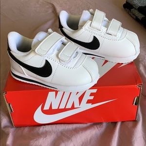 Size 5c white and black Nike cortez